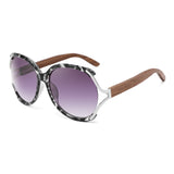 *Our Newest Kuma Sunglass* Rosewood